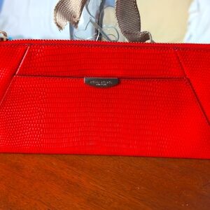 Henri Bendel Orange Clutch Wristlet. NWOT.